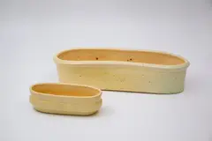 Jova Rancich, Large yellow trough vase, together with a smaller yellow trough vase by Briar Gardner