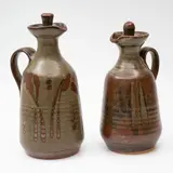 Crewenna Pottery (Harry & May Davis), Two large stoneware oil bottles, with tenmoku and grey ash glazes