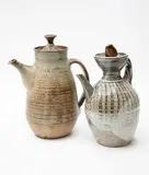 New Zealand Studio Pottery, Two stoneware lidded coffee pots, one by Jack Laird, the other by an unidentified potter (the latter with matched lid)