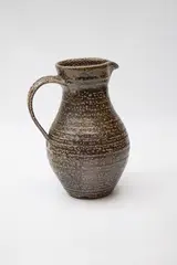 Large salt glazed jug by Potter Unknown, of tall elegant form, sold Feb 2024