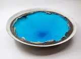 Crater Lake bowl by Len Castle, matt light grey stained earthenware, alkaline blue glaze to the interior, sold Feb 2024