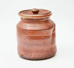 Ian Smail, Wood fired lidded jar, decorated with diagonal 'cuts' to the body