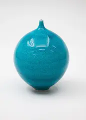 Small orb vase by Peter Collis, with crackle turquoise glaze, sold Feb 2024