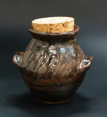 Small stoneware jar by Mirek Smisek, brown ash glaze, offered Feb 2024