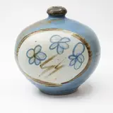 Neil Grant, Stoneware vase, decorated with medallions of stylised flowers on a brown and turquoise ground