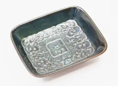 Small Ngakura Ware dish by Crown Lynn Potteries, with tiki decoration to the centre, offered Feb 2024