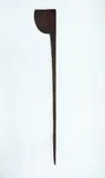 Tewhatewha, Long handled fighting staff, carved from dark brown wood with a rich patina, perforated suspension hole on inner edge of the blade. Long tapered shaft, with three grooves carved a quarter of the way up, large chip to butt end.