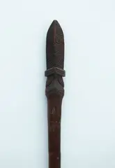 Taiaha, A small 19th century fighting staff century, the carved upoko and arero with finely carved with rauponga spirals terminating at a pointed tip.