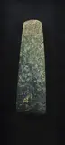 Toki - Adze, Large mottled medium green pounamu toki, 19th century or earlier, of quadrangular tapering form with straight vertical sides, poll slightly reduced in thickness. Short steep bevel and sharp blade.