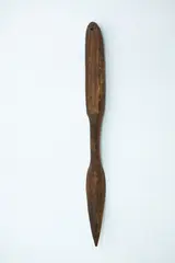 Ketu, Wooden digging implement, dark brown wood, oval handle, with single suspension hole, short rounded shaft and paddle shaped blade