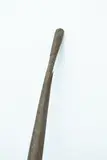 Kō, Digging Stick, Long carved medium brown pole tapering to a point at one end the other a narrow blunt end, split in the wood near blunt end
