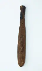 Patu Aruhe, Wooden fern root pounder, with semi rounded body, tapered down to handle end with rounded butt, with burn & scorch marks