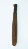 Patu Aruhe, Wooden fern root pounder, with semi rounded body, tapered down to handle end with rounded butt, with burn & scorch marks