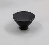 Keith Murray for Wedgwood, Rare black basalt small footed bowl