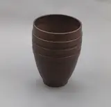 Keith Murray for Wedgwood, Rare large bronze basalt vase, of cylindrical form with three lathe turned bands to the upper section, shape no. 3877
