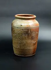 Large pot by Potter Unknown, salt-glazed earthenware in gradation of browns with sgraffito decoration, sold Oct 2023