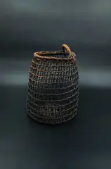 Woven basket by Ruth Castle, fine rattan, sold Oct 2023