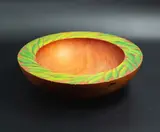 Chester Nicholls, Macrocarpa bowl, carved macrocarpa wood decorated with carved and painted foliage decoration on the rim