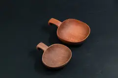 Two scoops by Levi Borgstrom, carved wood, sold Oct 2023