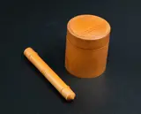 Richard Raffan Michael Tipping, Lidded box & needle case, the box in carved kauri with yew inlay, the needle case in carved Huon pine