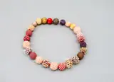 Axel Russmeyer, Beaded ball necklace, in pink, apricot and golden tones, hand-beaded comprising 22 glass, crystal and woven beads, with three added beads, 18ct gold hidden clasp