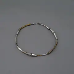 Necklace by Matthew von Sturmer, brass and sterling silver, offered Oct 2023