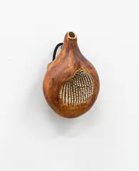Small hanging bottle by Len Castle, unglazed stoneware with umber pigment, impressed rope design to the center, sold Oct 2023