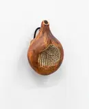 Small hanging bottle by Len Castle, unglazed stoneware with umber pigment, impressed rope design to the center, sold Oct 2023