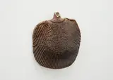 Hanging bottle by Len Castle, stoneware with textured ribbing pattern and bead motifs around the neck, sold Oct 2023