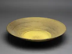 Sulphurous bowl by Len Castle, of unusual shallow hemispherical form with matt crackled glaze, sold Oct 2023
