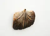 Len Castle, Hanging bottle, iron oxide-washed stoneware with textured finish and blue glaze inside the neck