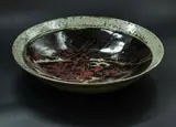 Len Castle, Stoneware bowl, tenmoku and ash glaze with wax resist gestural decoration