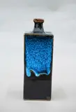 Square bottle vase by Len Castle, stoneware slab vase with jun glaze over tenmoku, sold Oct 2023