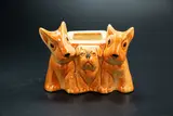 Rare Bulldog and Scottie dog vase by Crown Lynn Potteries, slip-cast ceramic with orange-brown glaze and black details, sold Oct 2023