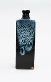 Square bottle vase by Len Castle, stoneware with jun glaze poured over tenmoku, sold Oct 2023