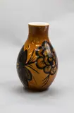 Daniel Steenstra for Crown Lynn, Hand-crafted vase, stylised painted black floral decoration on a brown lustre ground