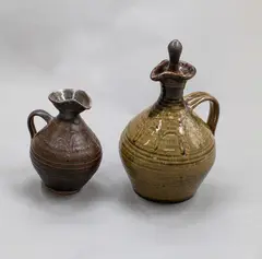 Clifford Smith, Stoneware oil pourer, together with a small Jane Capon jug