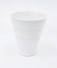White grooved vase by John Parker, porcelain with shiny white glaze, sold Oct 2023