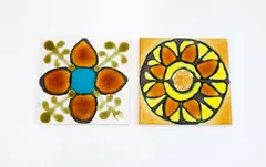 Charles Holmes, Two tiles (1978), glazed ceramics decorated with stylised floral motifs