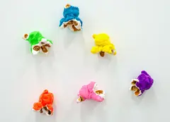Madeleine Child, Popcorn (2019), glazed ceramic, reflective glass beads, gold leaf, 6 parts