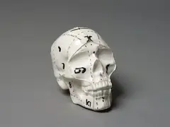 Skull by Martin Poppelwell, painted and glazed ceramic, sold Sep 2023