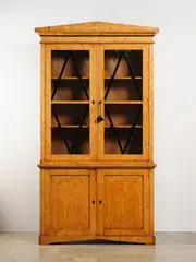 Biedermeier, Bookcase Chiffonier, in two sections, upper section bookcase with two glazed doors, featuring classic diamond-shaped