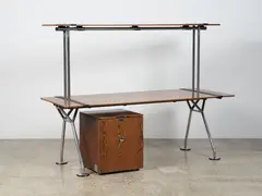 Nomos desk and cabinet by Norman Foster for Tecno, wenge wood and chrome steel, sold Sep 2023