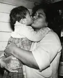 Ans Westra, Ruatoria (from Washday at the Pa, mum kissing daughter), 1963