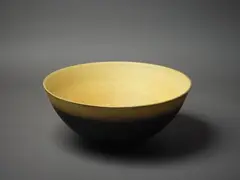 Sulphurous bowl by Len Castle, with crackle glaze interior and matte black exterior, sold Mar 2023