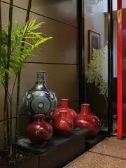 Nicholas Brandon, Five vases, with sang de boeuf type glaze (one a/f)