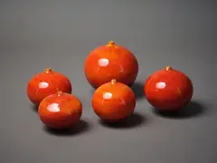 Five red-orange orb vases by Graham Ambrose, sold Mar 2023