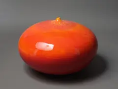 Graham Ambrose, An Orb vase, in rich orange glaze and with crackle effect to the top
