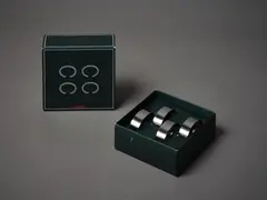 Stelton, Two sets of four napkin rings, in original boxes