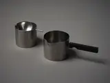 Arne Jacobsen for Stelton, Stainless steel pouring pot, together with an ashtray